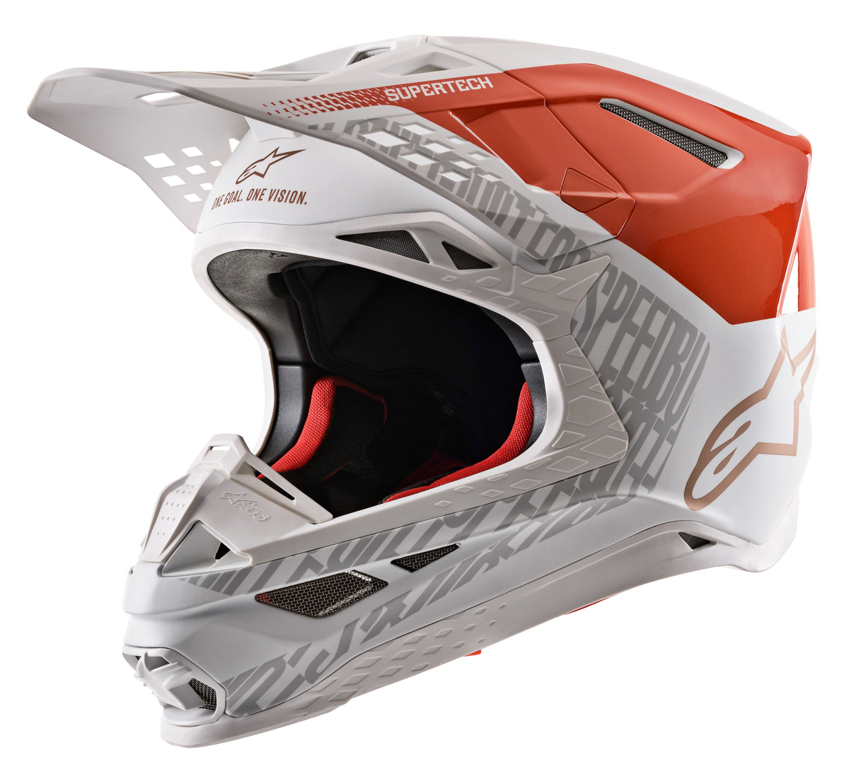 orange and white dirt bike helmet